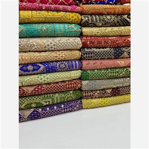 پارچه ساتن سوزن دوزی پرکار  مناسب خرجکار ومانتو کتی ومزونی وپیراهن مجلسی و محلی و کفتان