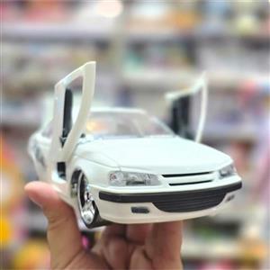 اسباب بازی ماشین پژو پارس شوتی پنوماتیک کف خواب سفید