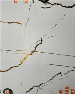 ماربل شیت سفید با رگه طلایی