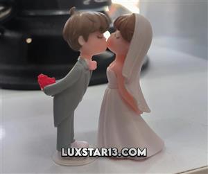 عروسک لرزان روی داشبوردی