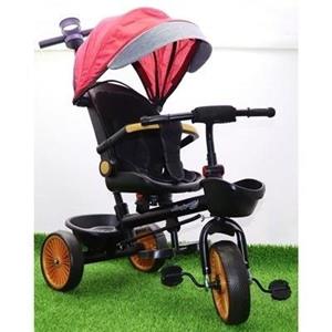 سه چرخه فلزی با سایه بان رنگ قرمز