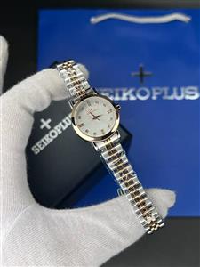 ساعت مچی زنانه سیکو پلاس SEIKO PLUS  صفحه طوسی نگین دار بند استیل رزگلد
