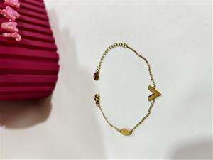 دستبند یا پابند Valentino استیل مدل وی طلایی