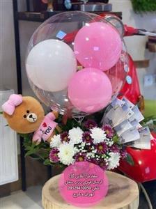 دسته گل و کیک تولد برای نوزاد دختر