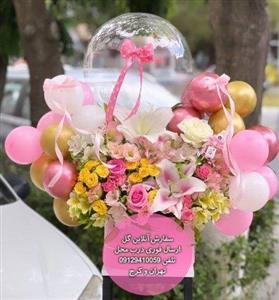 دسته گل و کیک تولد برای نوزاد با تزیین گیفت