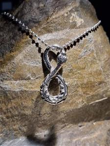 پلاک برنجی طرح مار بینهایت رنج سیلور