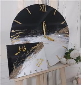 ساعت دیواری رزینی سفید مشکی