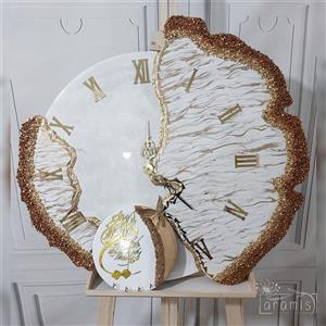 ساعت دیواری دفرمه رزینی سفید طلایی طرح ژئود
