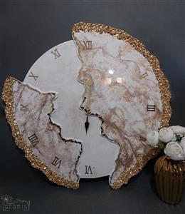 ساعت دیواری رزینی دفرمه سفید طلایی