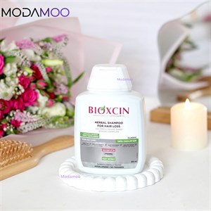 شامپو بیوکسین کافئین و آرژنین ضد ریزش مو