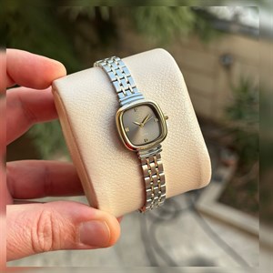 ساعت ویتوریا زنانه دورنگ طلایی ص دودی VT3455