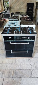اجاق گاز ۵ شعله تکنوا طرح فر نما استیل صفحه شیشه ای ولوم بالا ۳ کشو