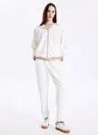 کرم رنگ زنانه شلوار ورزشی مدل F4WL-EA W70 E 4.0 Design Studio x Fabrika