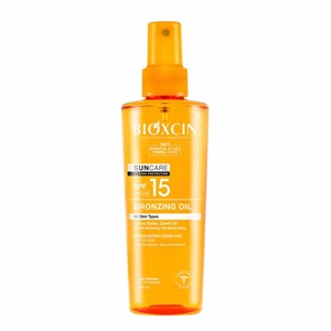 روغن آفتاب برنز کننده کاکائو و هویج بیوکسین Bioxcin spf15 حجم 200 میل