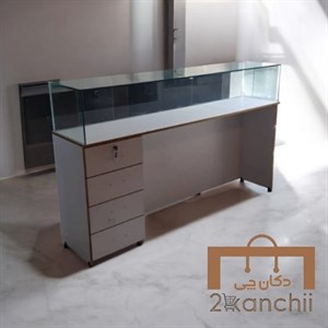 میز ویترینی شیشه‌ ای کشودار مخصوص فروشگاه، طلافروشی و موبایل‌ فروشی