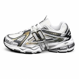 کتانی مردانه نیوبالانس 1906 طوسی مشکی طلایی New BALANCE 1906A