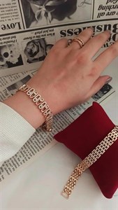 دستبند زنجیری ژوپینگ طرح مسیکا فول نگین مخراج کاری شده رنگ طلایی در اندازه 17/5 تا 19/5 در 10میل