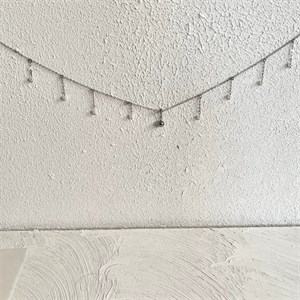 زنجیر شکم مرواریدی با پیرسینگ ناف
