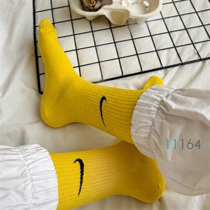 جوراب ساق‌دار طرح نایکی زرد