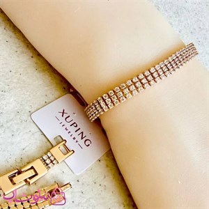 دستبند زنانه ژوپینگ طرح تنیسی طلایی سفید سه لاین کد 6491