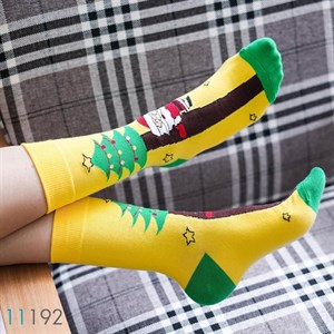 جوراب ساق‌دار طرح بابانوئل و درخت کریسمس