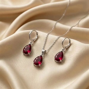 نیم ست طرح اشکی نقره‌ای با نگین قرمز 