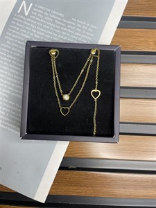 ست دخترانه گردنبندگوشواره ودستبندطرح قلب طلایی رنگ ثابت