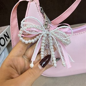چارم بگ پاپیونی پینترستی آویزکیف صورتی مرواریدی