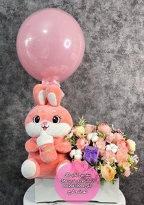 دسته گل و کیک برای نوزاد یک‌روزه
