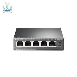 سوئیچ غیر مدیریتی 5 پورت تی پی لینک مدل TL-SF1005P TP-LINK TL-SF1005P 5Port Desktop PoE Switch