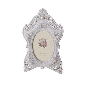 قاب عکس بیضی افقی سفید  مدل نگین درشت شیک و تک