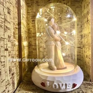 تندیس چراغدار مجسمه زن و مرد داخل شیشه