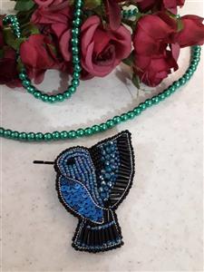 گل سینه طرح پرنده