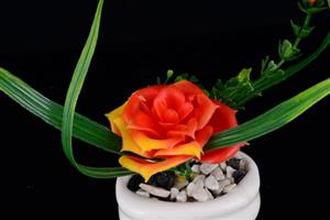   گلدان به همراه گل مصنوعی هومز طرح ارکیده و رز مدل 30710