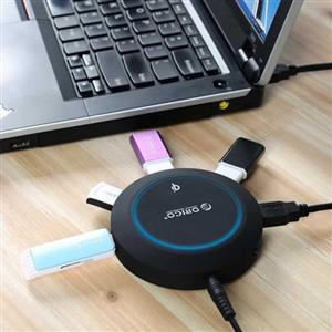 هاب USB 3.0 پنج پورت همراه با شارژر بی‌سیم اوریکو مدل HCP-5US Orico HCP-5US 5-Port USB 3.0 Hub With Wireless Charger