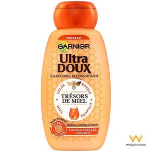 شامپو ترمیم کننده و تغذیه کننده مو گارنیه سری Ultra Doux مدل Honey حجم 400 میلی لیتر Garnier Ultra Doux Honey Hair Shampoo 400ml